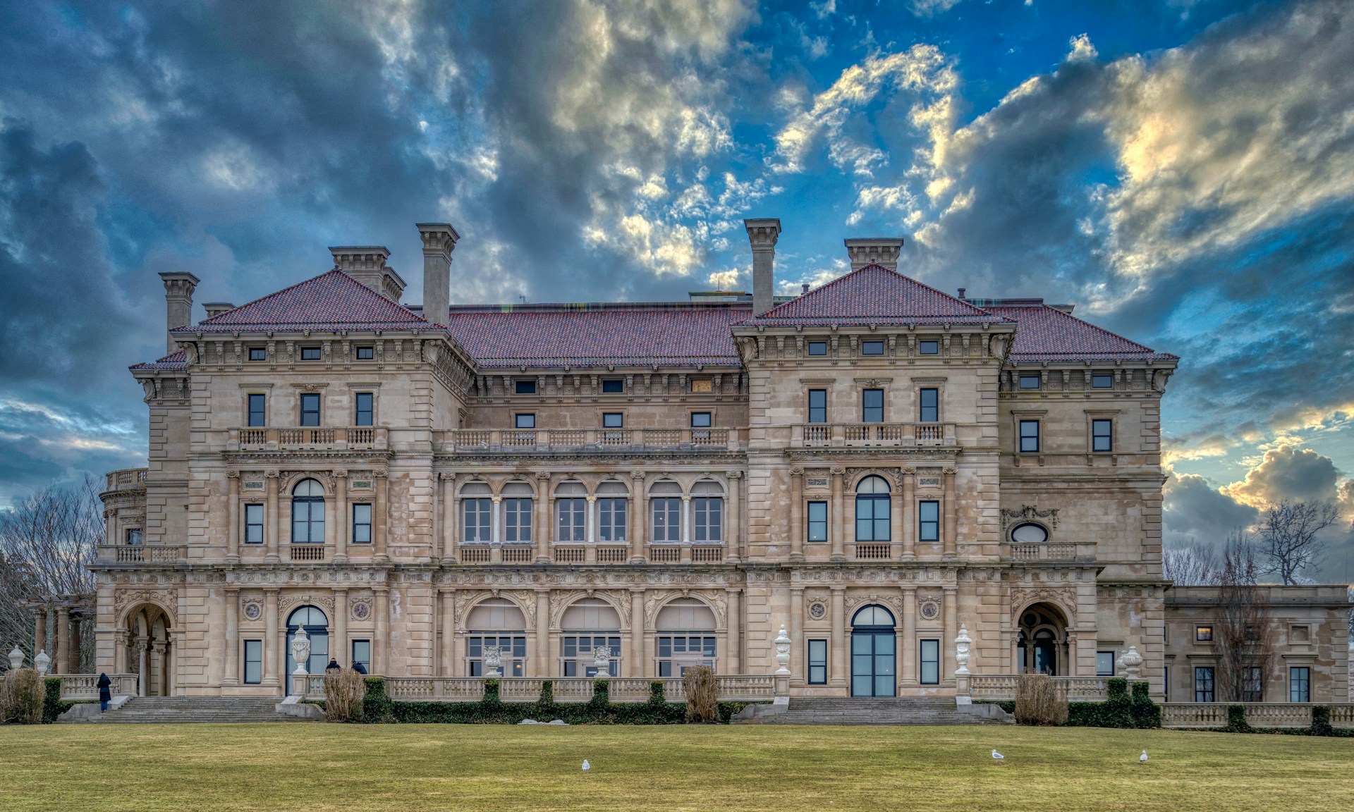 The Breakers Mansion in Newport with dramatic cloudy sky