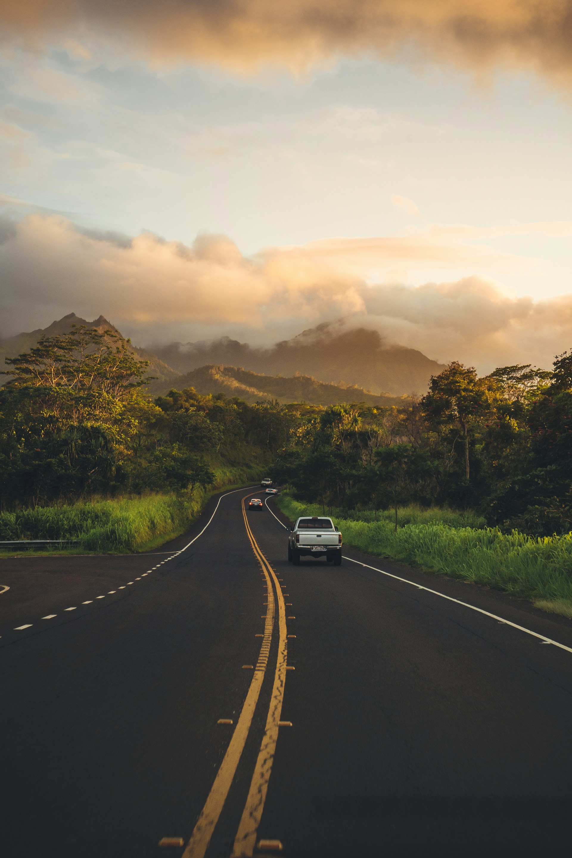 Scenic road on the Big Island of Hawaii with mountains and lush greenery